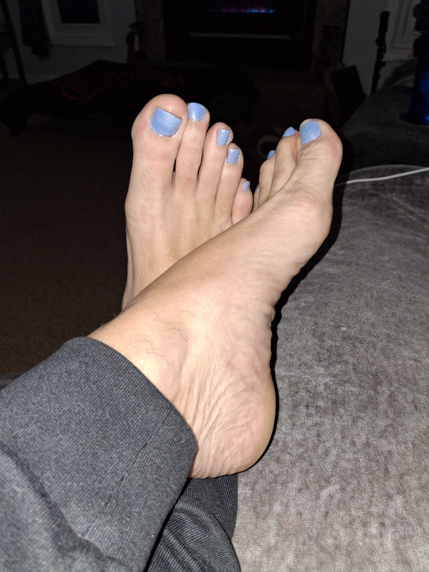 She paints my toes before we play footsie