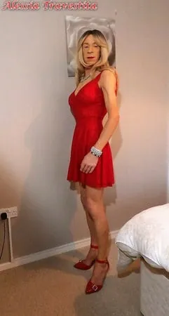    alessia travestita in flirty red dress         