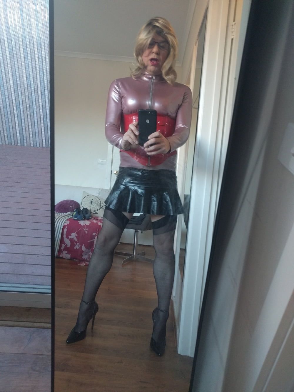 Back as a short blonde latex girl #5