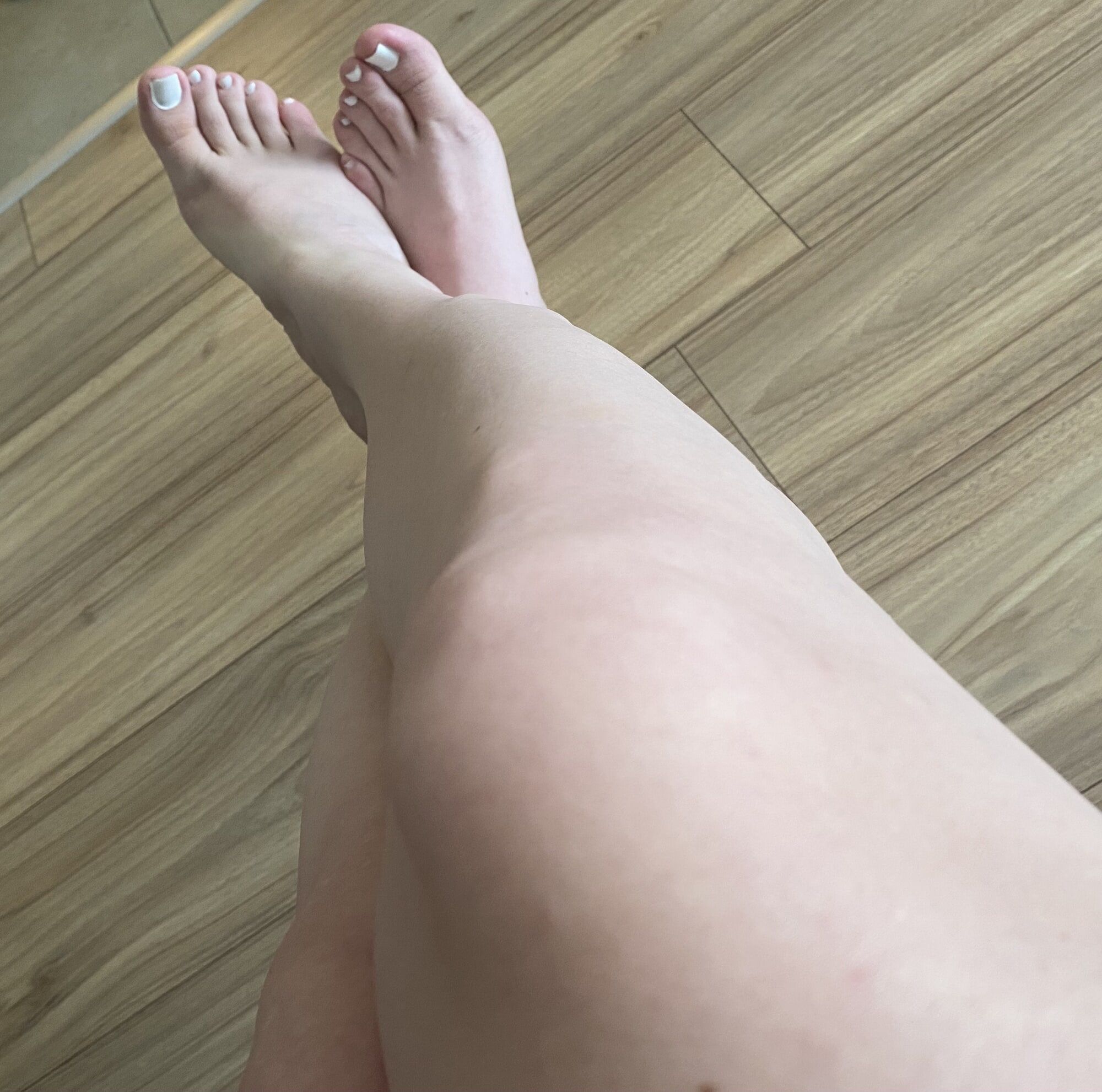 White polished nails and shaved legs #2