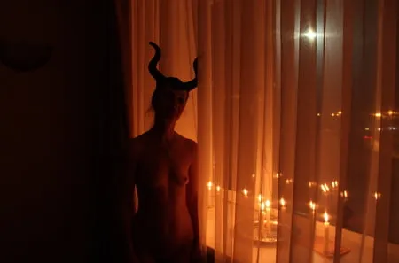 naked maleficent with candles         