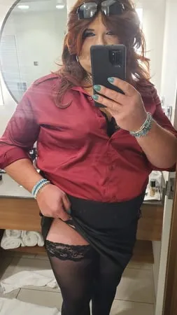 red satin shirt and black stockings         