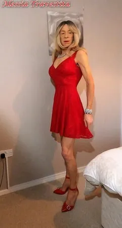    alessia travestita in flirty red dress         