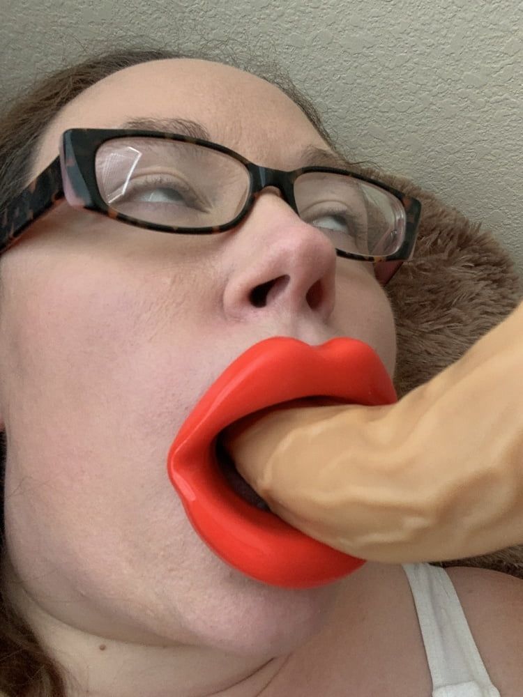 Big fake Lips sucking cock