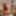 Red-haired Teen Beauty Girl dances sexy Striptease
