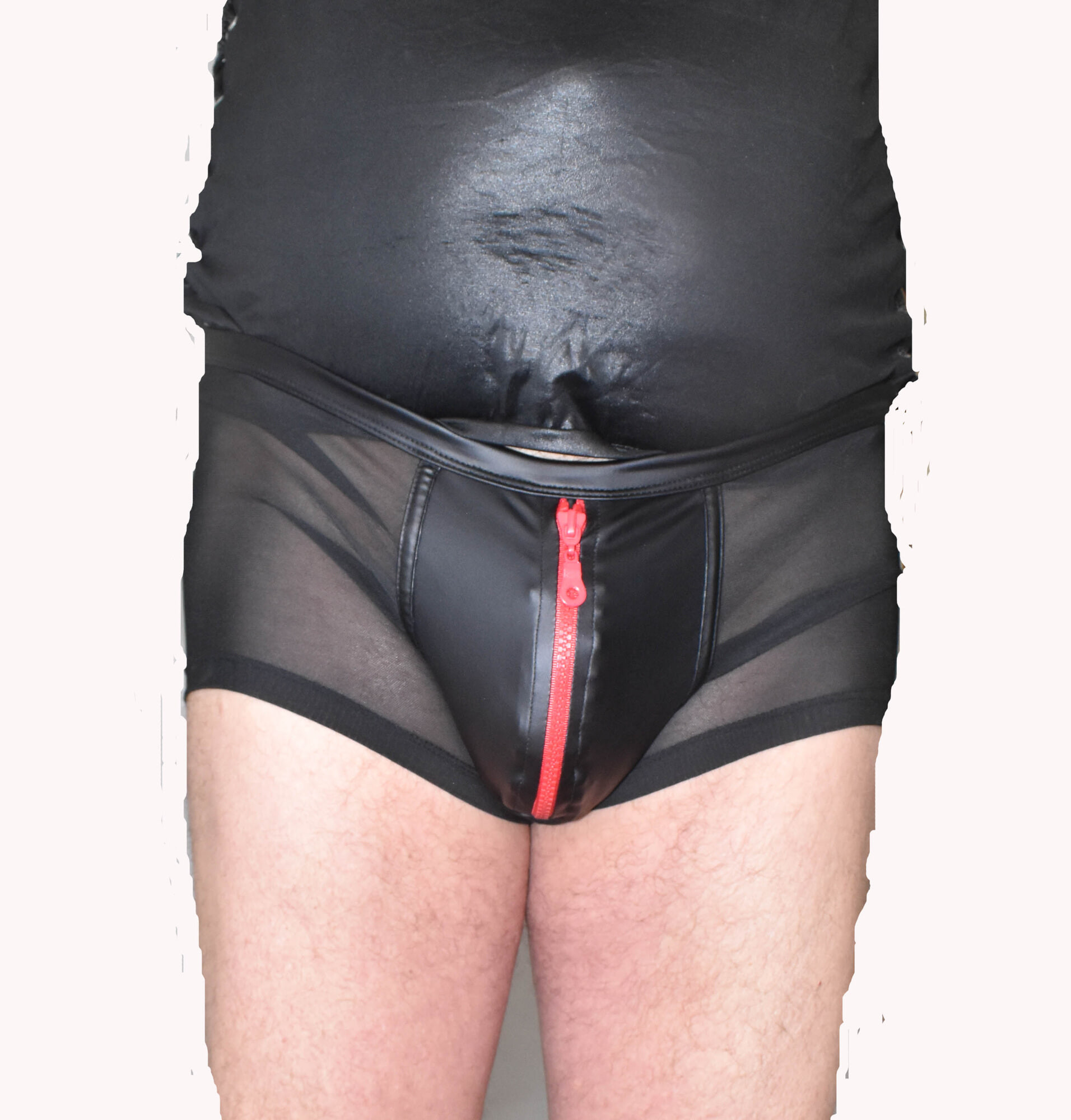 DRESSED IN A TIGHT NYLON SHORTS.