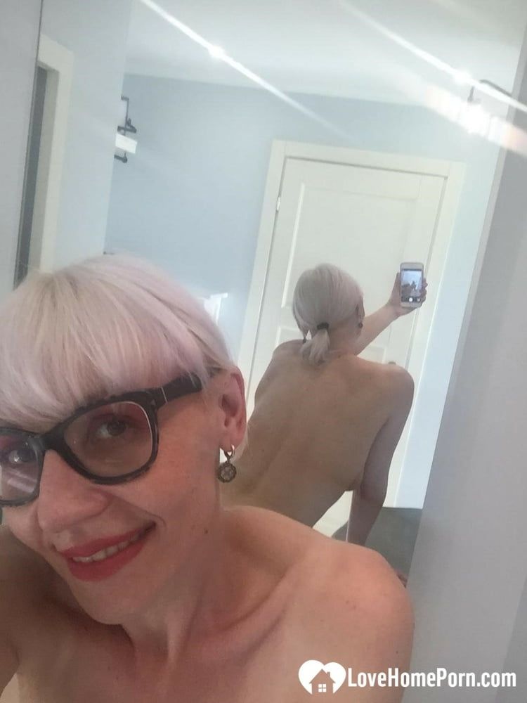 Blonde MILF with glasses teasing with nudes #36