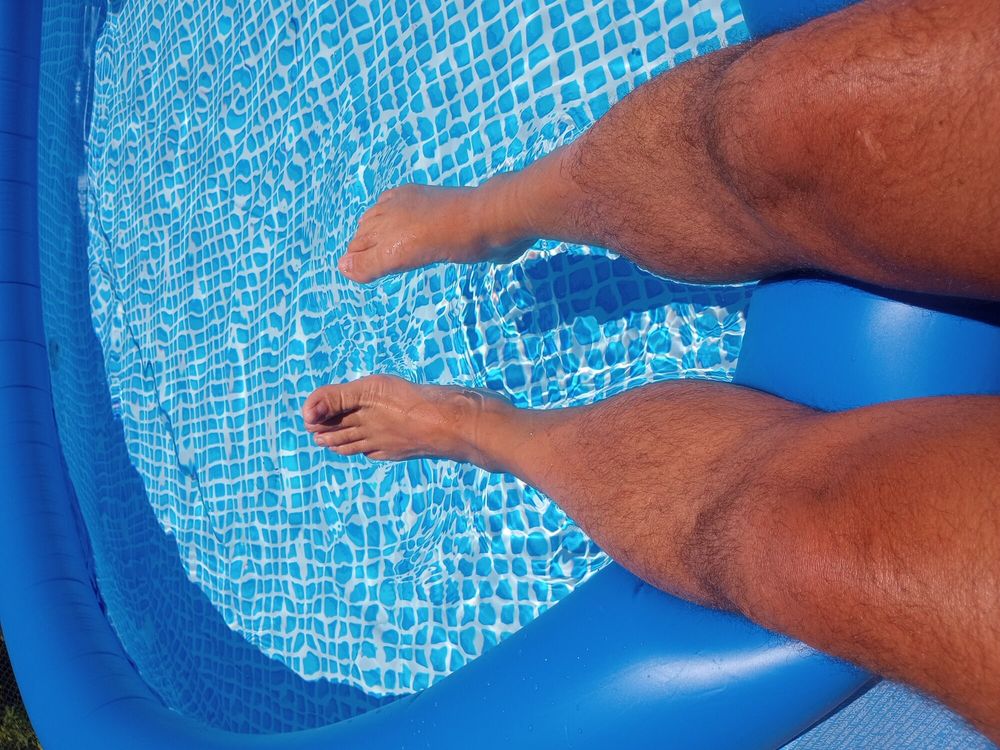 My bare feet and hairy legs getting a tan #2