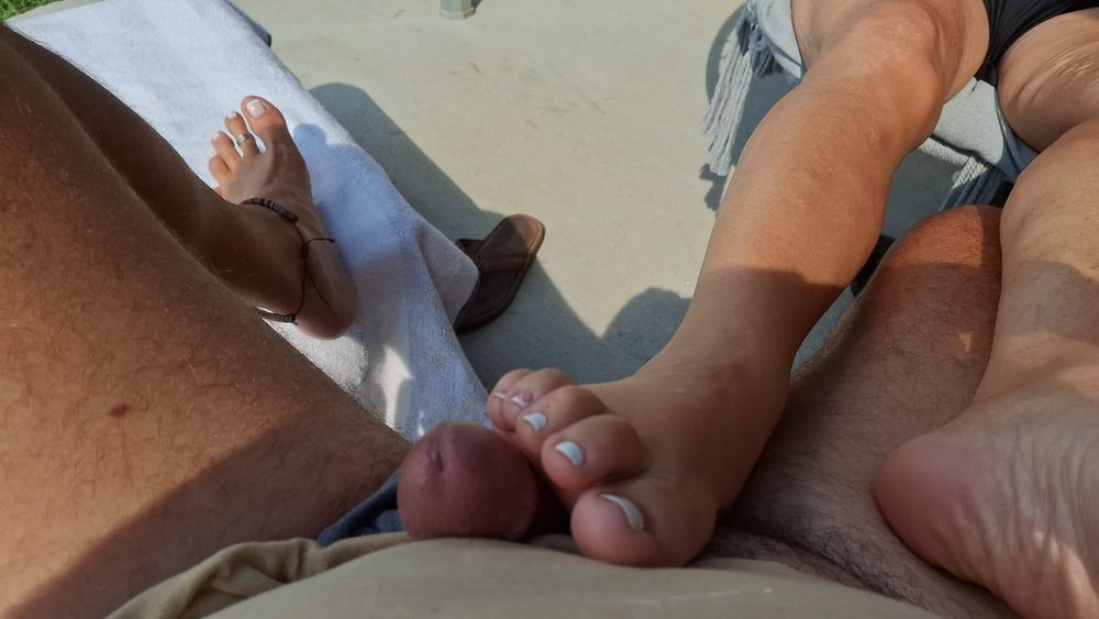 Playing footsie leads to a Foot job outside #16