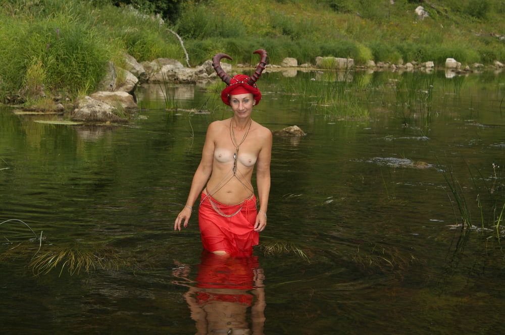 With Horns In Red Dress In Shallow River #21