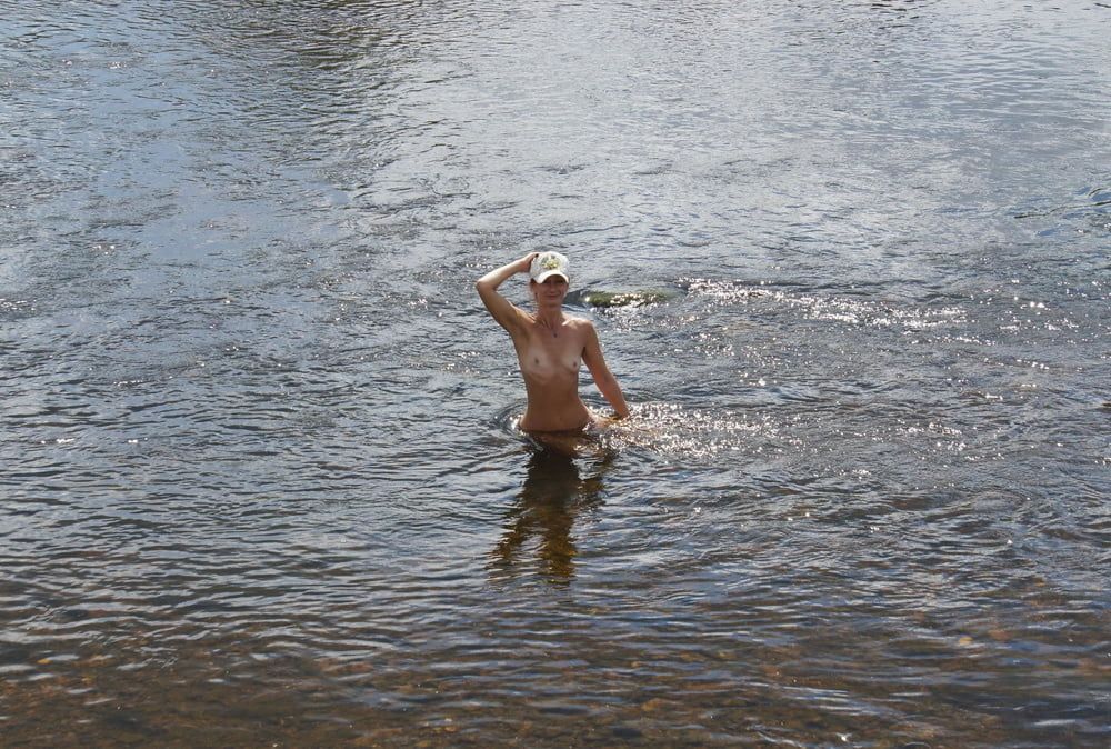 Nude in river's water #10