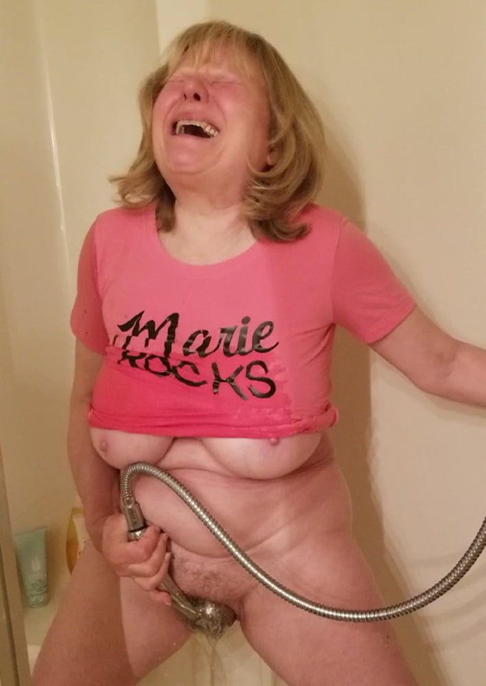 Hot grandmother sprays her pussy and cums in a wet t-shirt #50