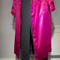 Sissy dressing up in a satin trench coat and long dress