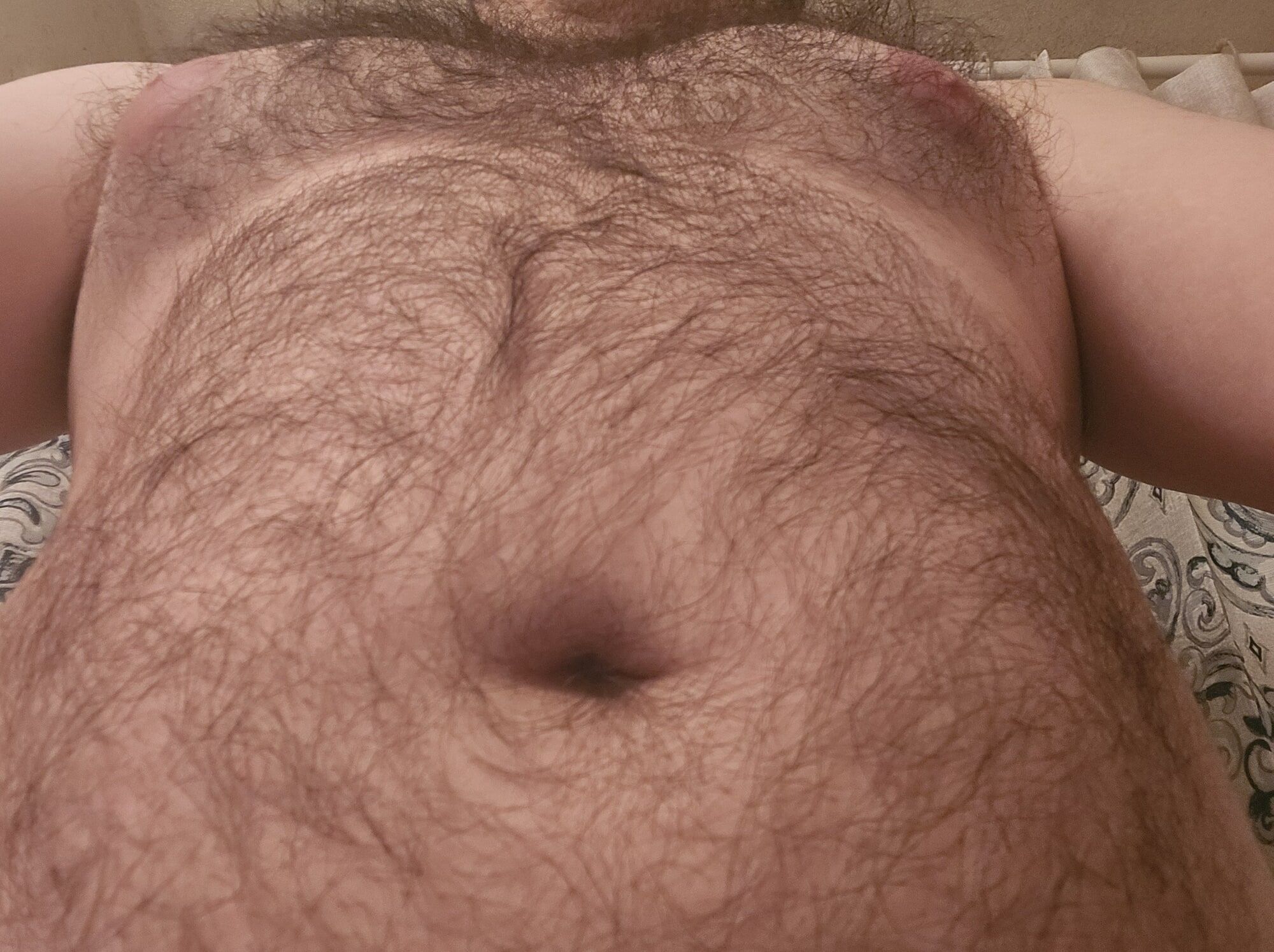 Just a hairy boy with a nice set of suckable boobs