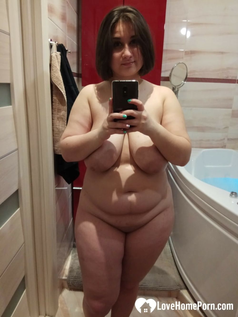 Chubby amateur teases with her big tits #40