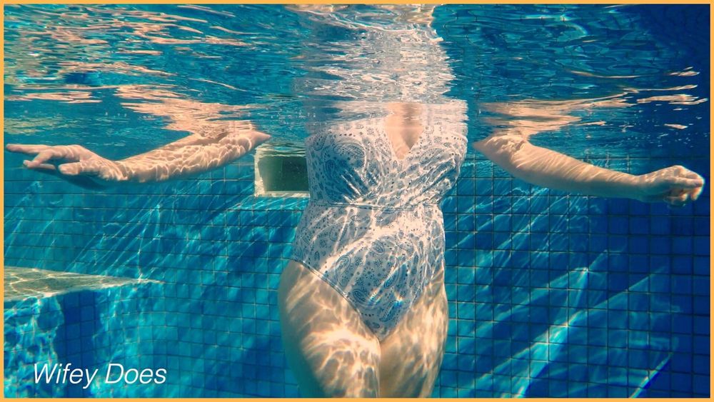 Wifey looks amazing in the pool in a hot one piece