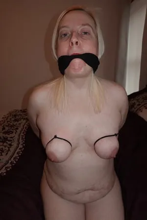 gagged slut with tits tied         