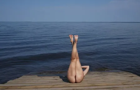 legs play on a wooden platform         