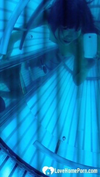 Asian sweetie taking selfies while tanning her body #4