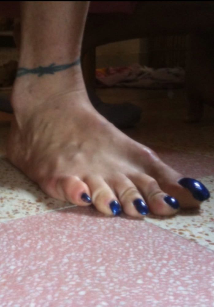 Blue toenails under sun ray #36