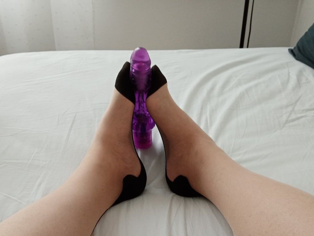 MILF tranny in a lying position simulates a Footjob-vibrator #5