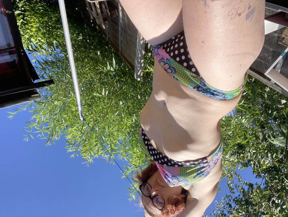 You’re laying in my garden whilst I reach over in a bikini #19