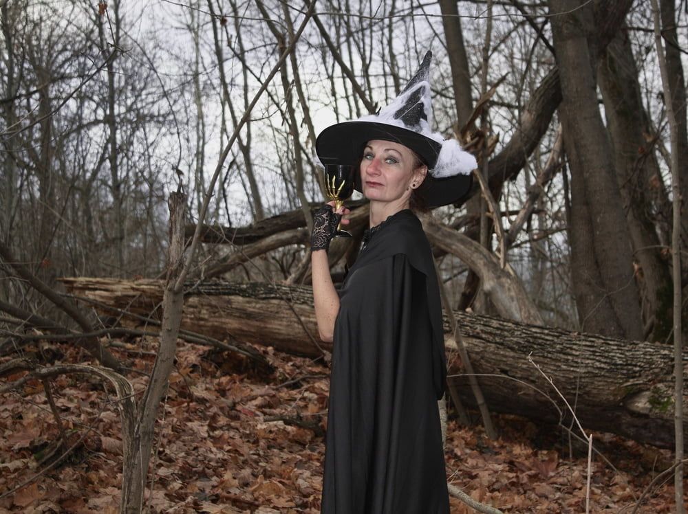 Witch with broom in forest #16