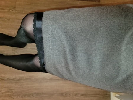 grey pencil skirt with black silky half slip         