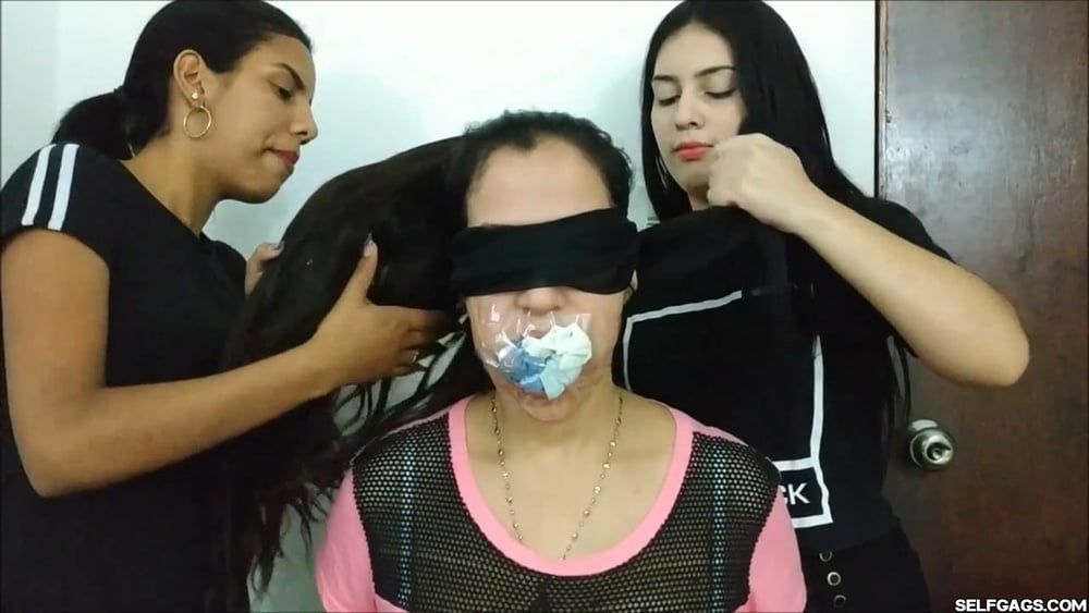 Gagged Woman Mouth Stuffed With Multiple Socks - Selfgags