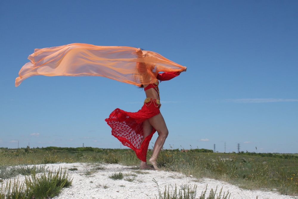 On top with an orange shawl