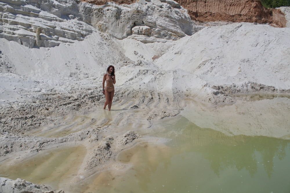 Bathing in white clay quarry #4