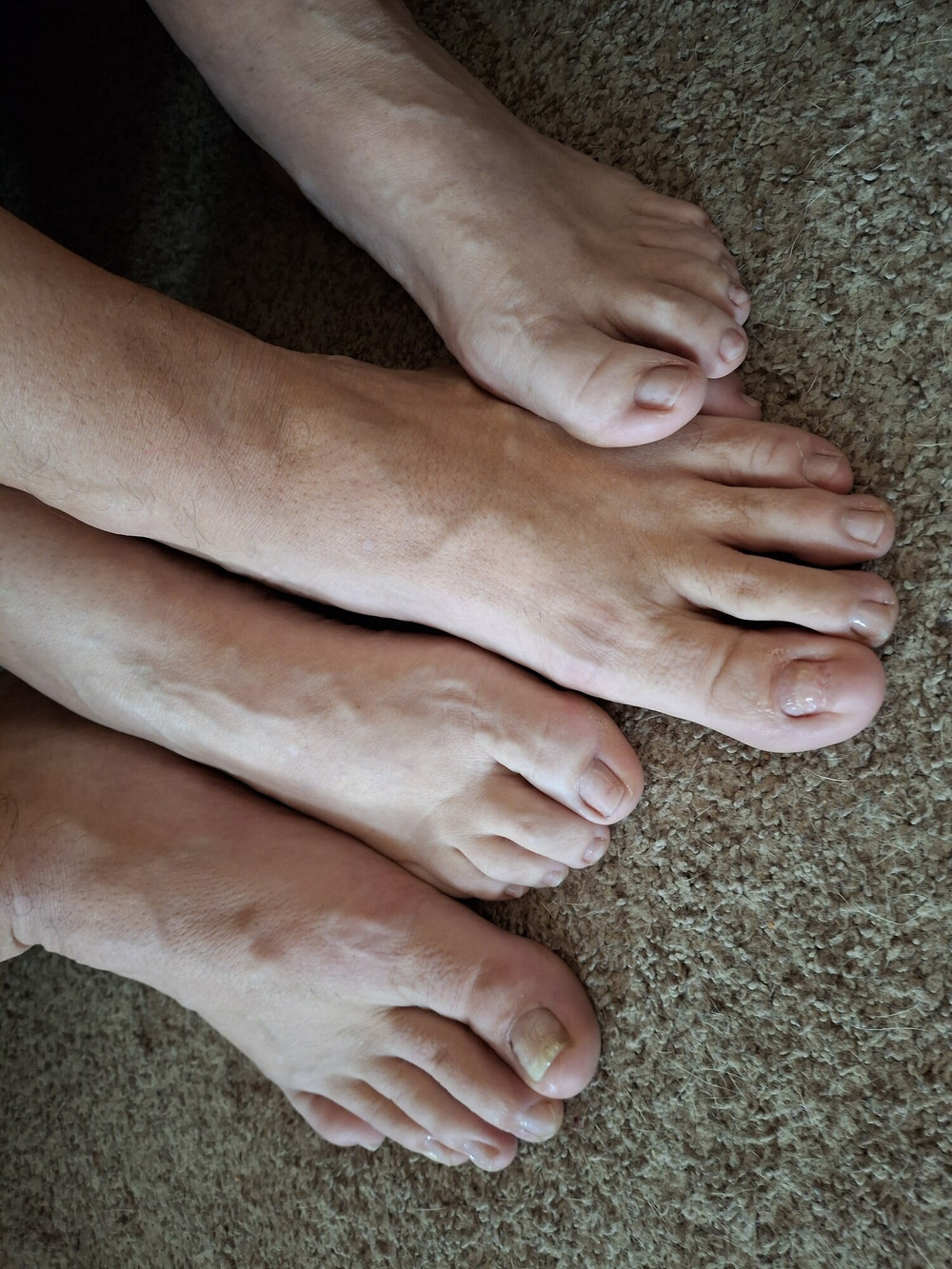 Showing off our un polished toes #4