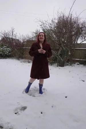 pregnant flashing naked in the cold snow         