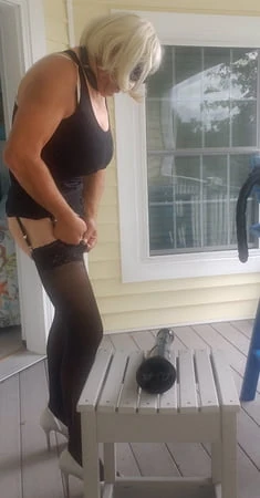 black top and white skirt on porch         