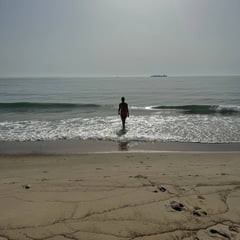 My wife on the beach