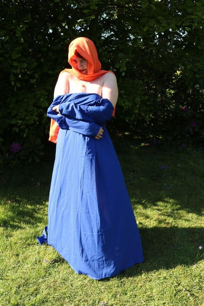 hijab and abaya flashing outdoors #27