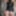 Cute brunette tattooed teen posing in abandoned building