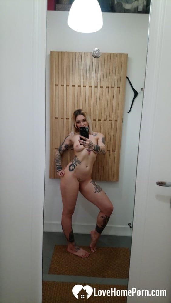 Tattooed hottie plays with herself while taking selfies #16
