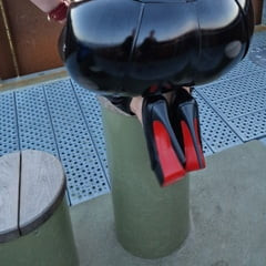 MissBigButt visits an overlook wearing her shiny dress