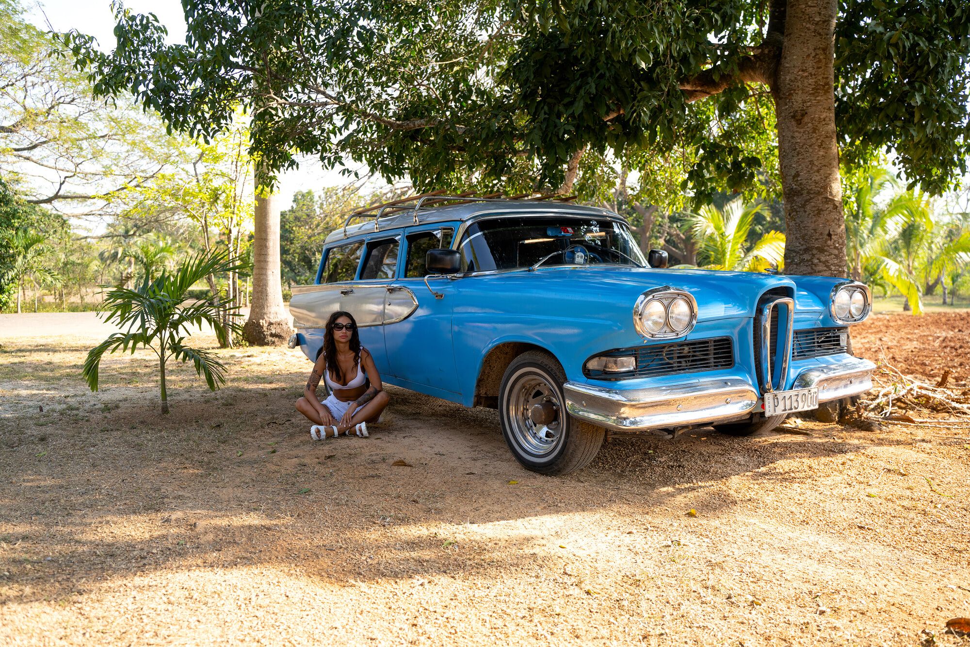 Monika Fox In White Next To A Vintage Car In Cuba