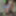 Young wife undresses and walks naked in the forest park