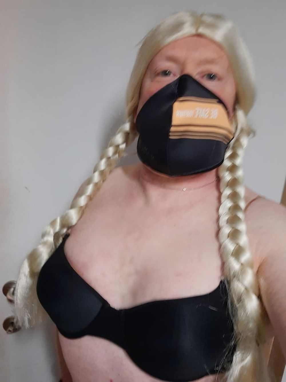 Ginger crossdresser wears bra #4