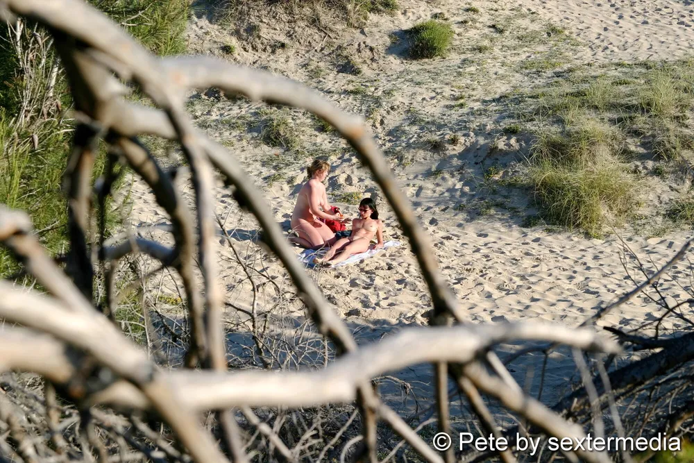 Naked lesbians have fun on the beach #21