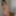 Brunette in stockings shoving a banana into herself