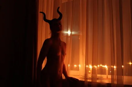 naked maleficent with candles         