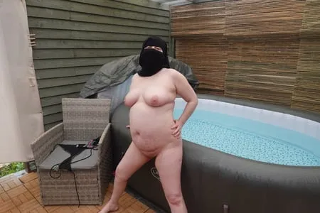 wife showing off big breasts and ass in niqab         