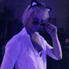 Black&amp;White cat posing in the sunglasses at UV light