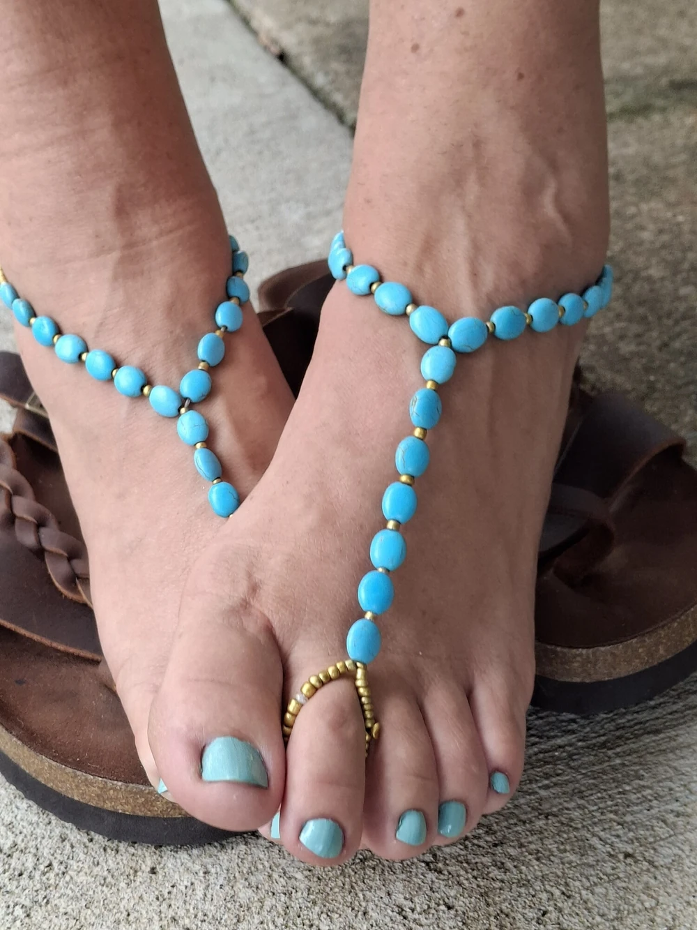 Cute feet wearing barefoot sandals #5