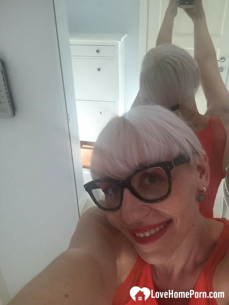 Blonde MILF with glasses teasing with nudes #9