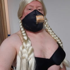Ginger crossdresser wears bra